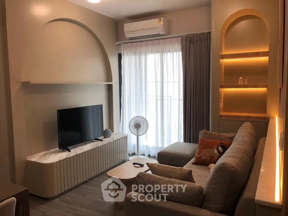 Modern living room with stylish decor and natural light