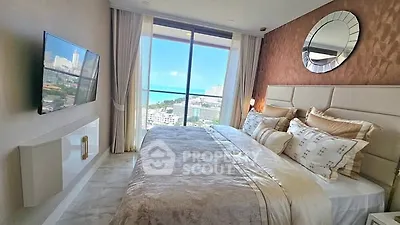 Luxurious bedroom with stunning ocean view and elegant decor