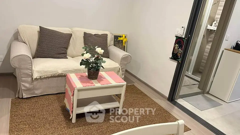 Cozy living room with comfortable sofa and stylish decor