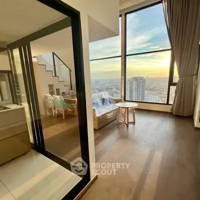 Luxurious high-rise apartment with stunning city view and modern interior design.