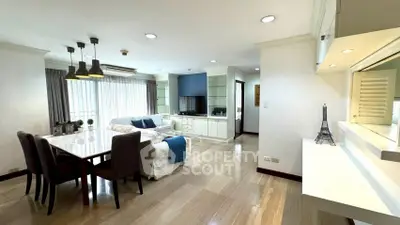 Spacious modern living room with elegant dining area and natural light