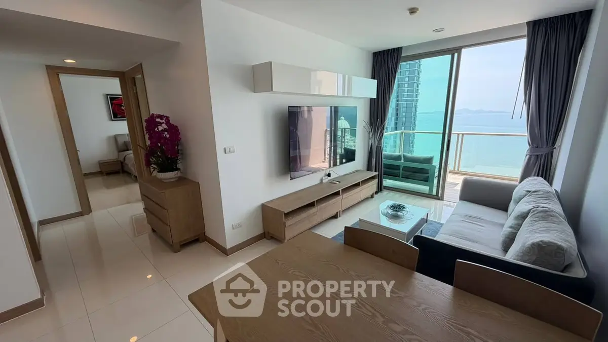 Modern living room with ocean view and stylish furniture