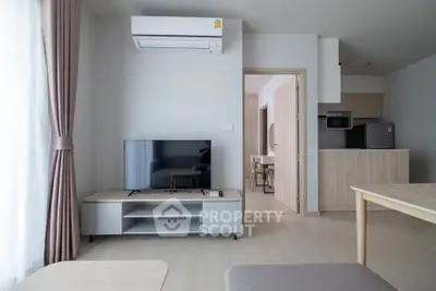 Modern living room with air conditioning and open kitchen layout