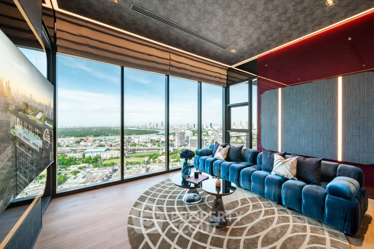 Luxurious living room with panoramic city views and modern decor