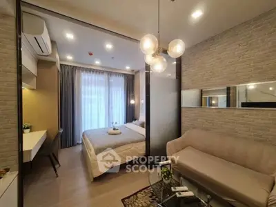 Modern studio apartment with cozy living area and stylish bedroom
