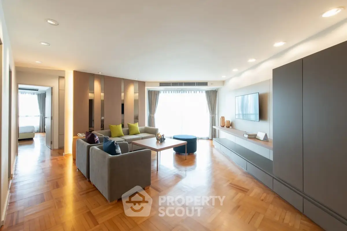 Spacious modern living room with elegant decor and natural light