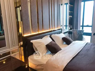 Luxurious modern bedroom with elegant lighting and large windows