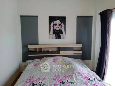 Modern bedroom with stylish decor and natural light