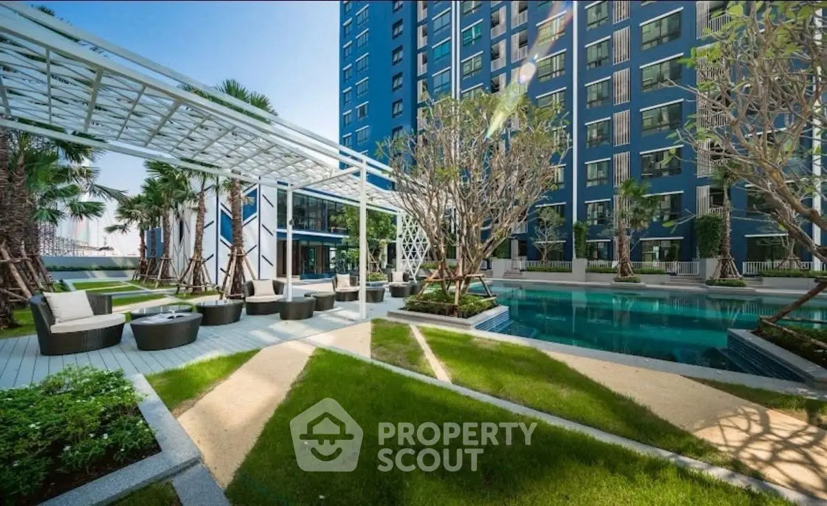Luxurious apartment complex with pool and landscaped garden