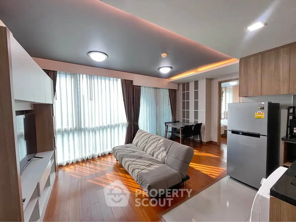 Modern living room with sleek design and natural light