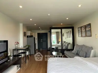 Spacious modern studio apartment with open layout and stylish decor