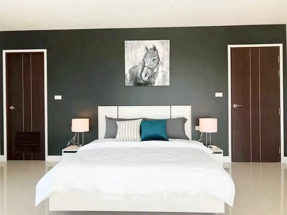 Modern bedroom with stylish decor and elegant lighting