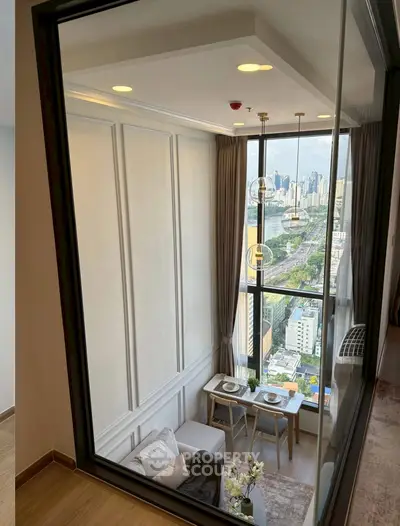 Stunning high-rise apartment with floor-to-ceiling windows and city view