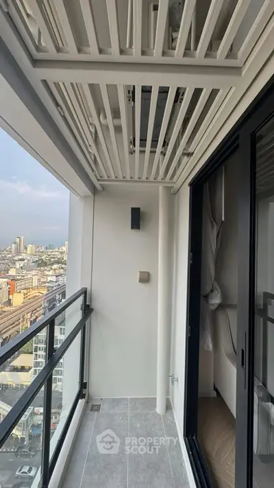 Modern balcony with city view and sleek railing design