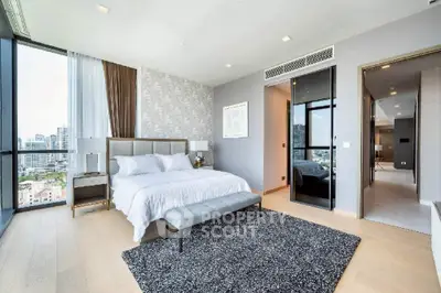 Luxurious modern bedroom with city view and elegant decor