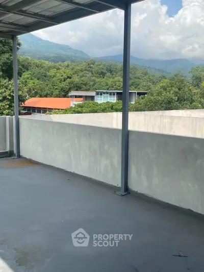 Spacious balcony with stunning mountain views and modern design