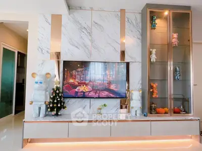 Luxurious living room with modern decor and stylish TV setup