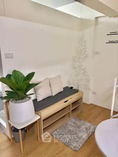 Cozy modern living area with stylish bench and indoor plant