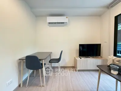 Modern living room with air conditioning and minimalist furniture, perfect for cozy urban living.