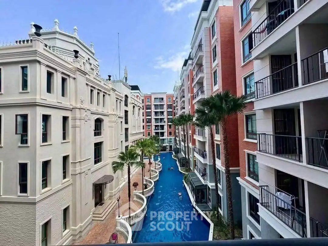 Luxurious apartment complex with stunning pool and elegant architecture