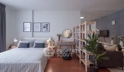 Stylish modern bedroom with cozy decor and open layout