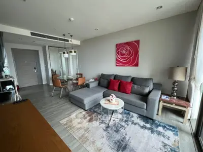 Modern living room with stylish decor and cozy seating area in a contemporary apartment.