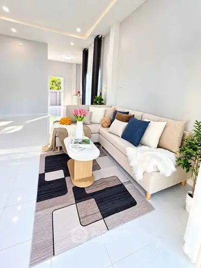 Spacious modern living room with stylish decor and natural light