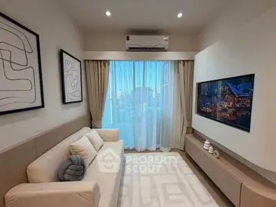 Modern living room with elegant decor and large window view