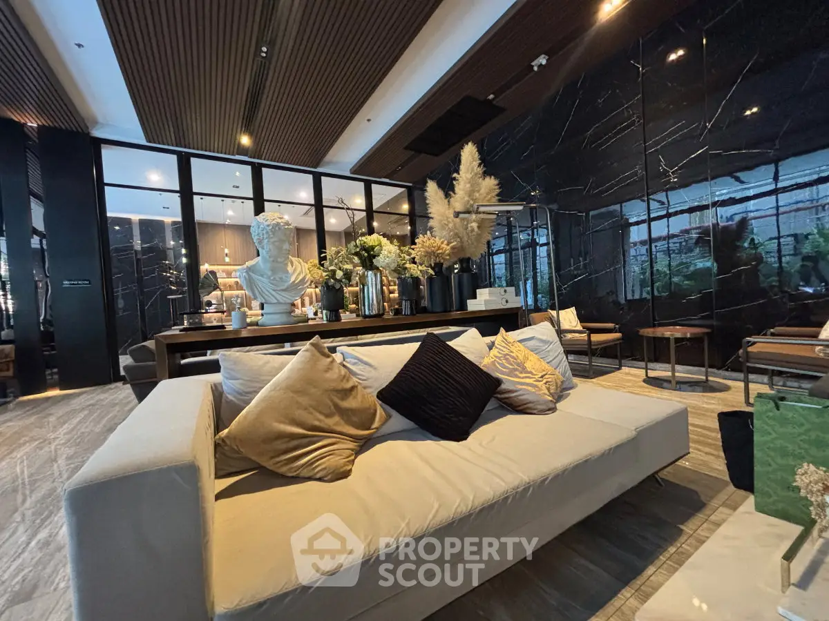 Luxurious modern living room with elegant decor and plush seating in a high-end property.