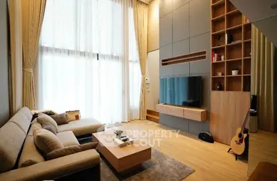 Luxurious modern living room with high ceilings and elegant decor