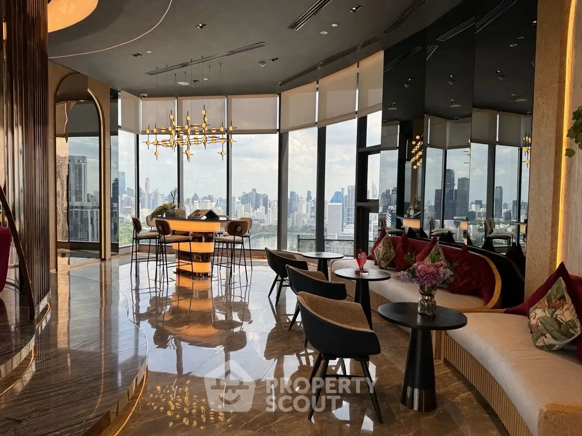 Luxurious high-rise living room with panoramic city views and elegant modern furnishings.