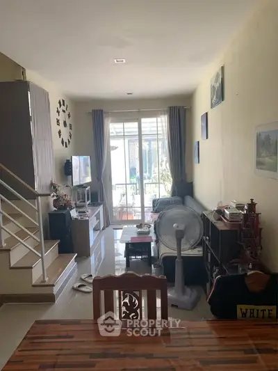 Cozy living room with modern decor and natural light