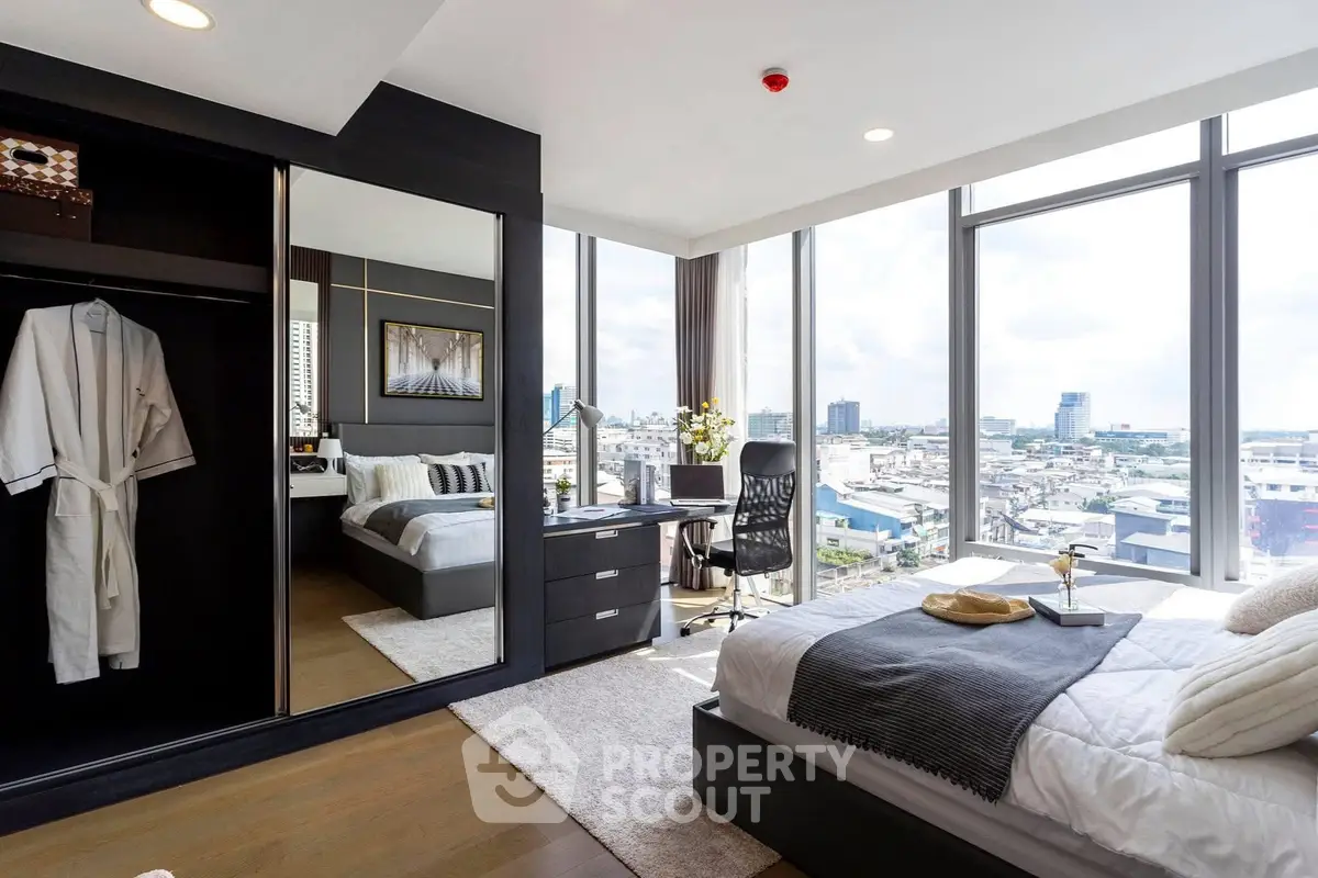Luxurious bedroom with stunning city view and modern decor