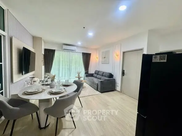 Modern living room with dining area and stylish decor