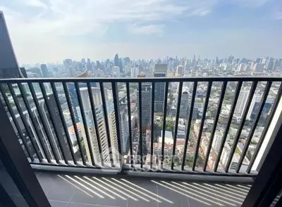 Stunning high-rise balcony with breathtaking city skyline view, perfect for urban living enthusiasts.