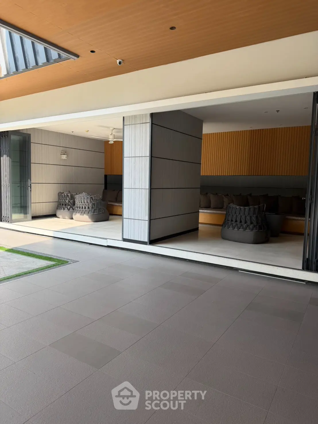 Modern shared lounge area with stylish seating and open layout