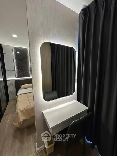 Modern bedroom with stylish vanity and elegant lighting