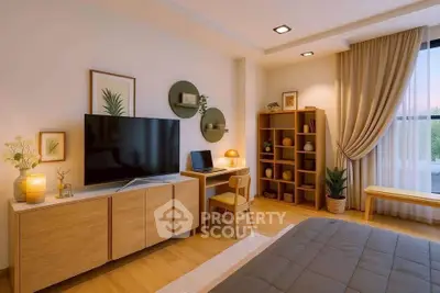 Modern bedroom with stylish decor, large TV, and cozy workspace, featuring natural light and elegant furnishings.