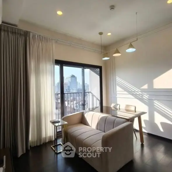 Modern living room with city view, featuring elegant sofa and dining area, perfect for urban living.
