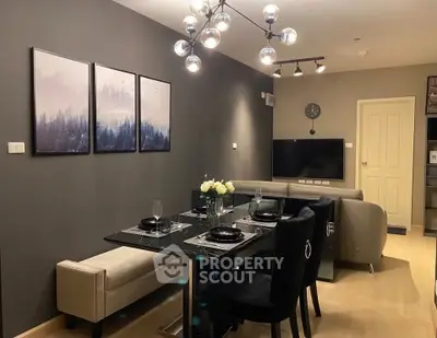 Modern living room with elegant dining area and stylish decor