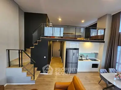 Modern loft apartment with open kitchen and stylish mezzanine bedroom