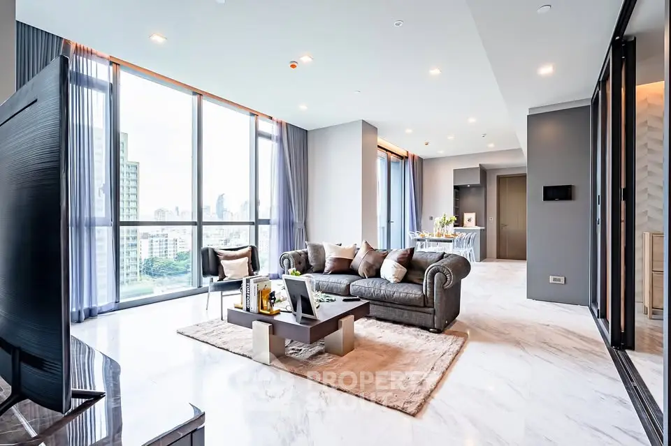Luxurious modern living room with panoramic city views and elegant decor