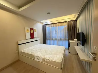 Modern bedroom with stylish decor and natural light