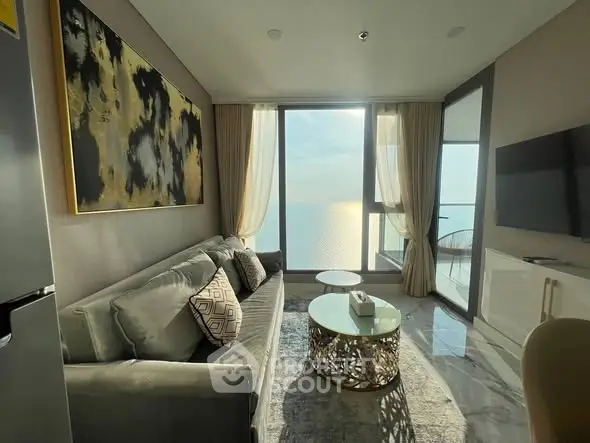 Luxurious living room with stunning ocean view and elegant decor