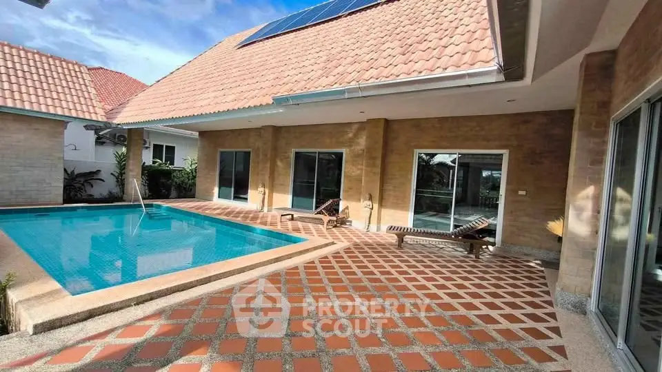Stunning villa with private pool and spacious patio, perfect for luxurious outdoor living.