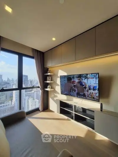 Modern living room with city view and built-in entertainment unit