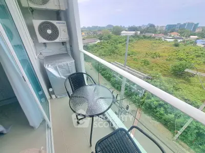 Charming balcony with scenic view, perfect for relaxation and enjoying the outdoors.