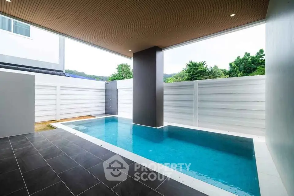 Luxurious private pool area with modern design and sleek tiles, perfect for relaxation and entertainment.