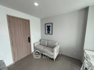 Modern minimalist living room with cozy sofa and stylish wall art