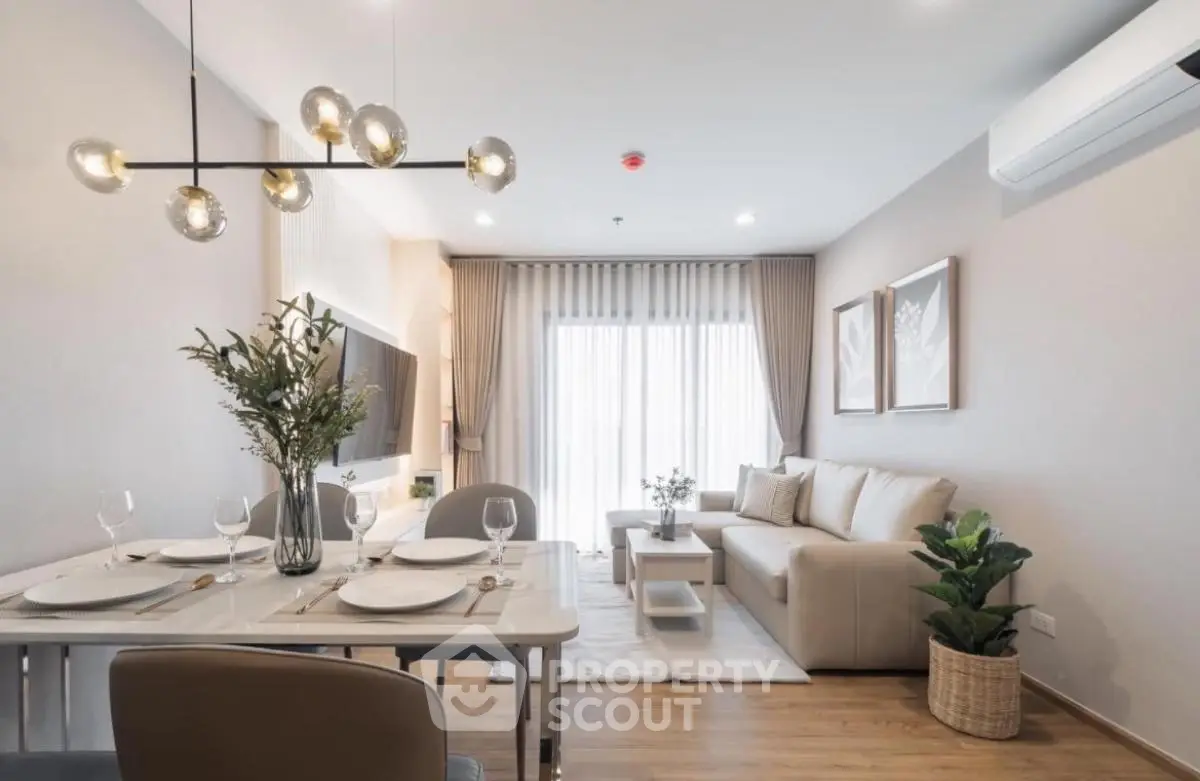 Modern living room with elegant dining area and stylish decor